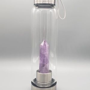 Amethyst crystal water bottle, new still in box. Purchased as gift
